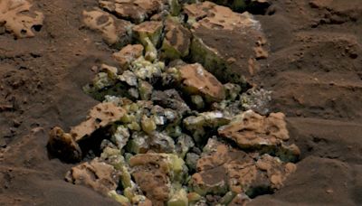 Accidentally exposed yellowish-green crystals reveal ‘mind-blowing’ finding on Mars, scientists say