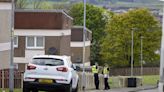 Major police response locks down Scots street after 'unexplained' death of man