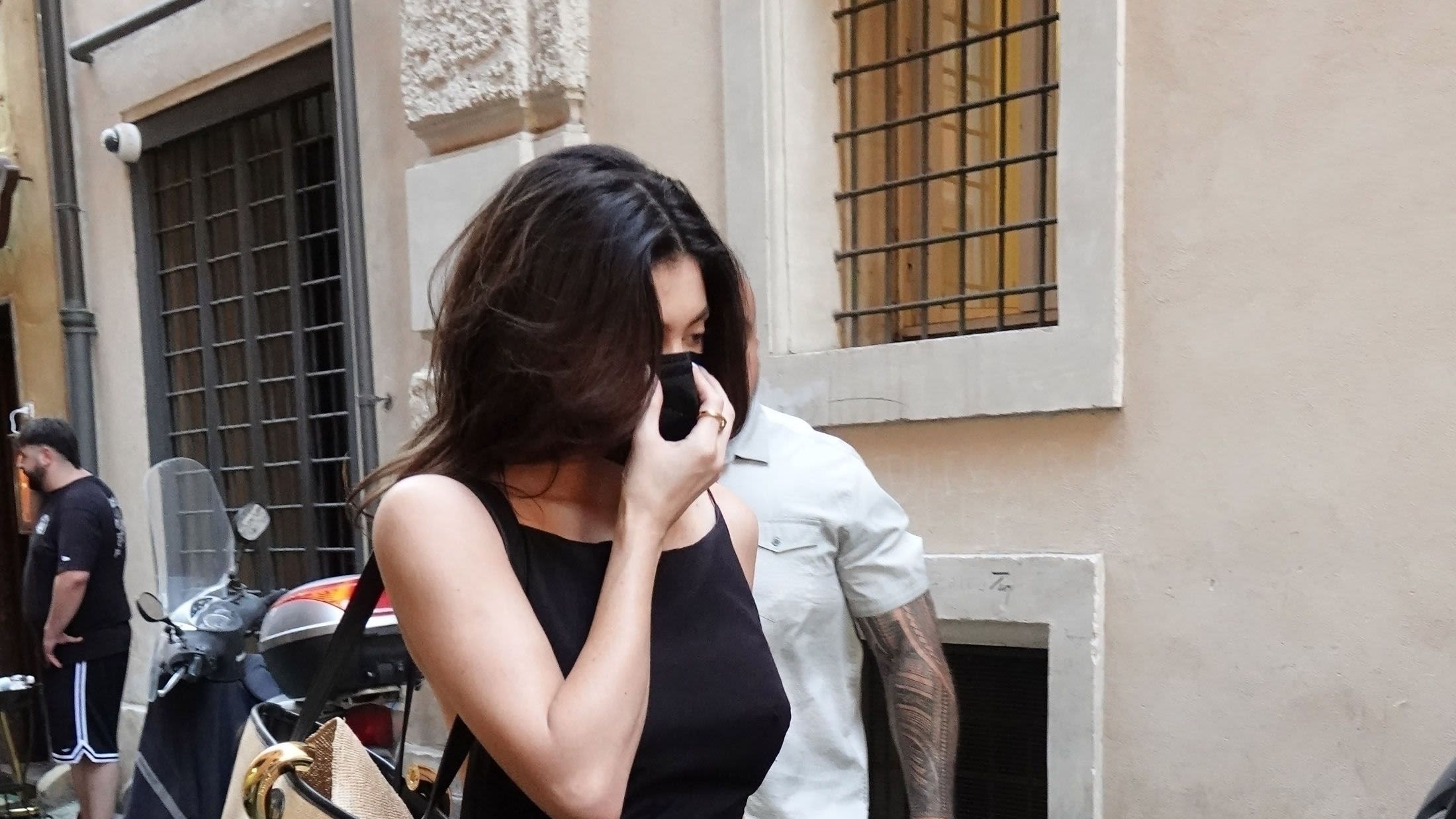 Kylie Jenner Pairs Her Black Summer Dress With the Most Polarizing It Shoe