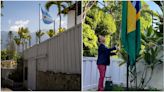 El momento en que funcionarios izan la bandera de Brasil en la embajada argentina en Venezuela