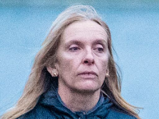 Toni Collette fails to raise a smile as she leaves a yoga class