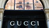 Python abuse alleged at supplier of skins used for Gucci handbags