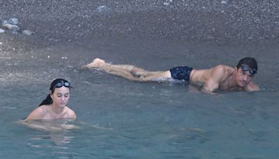 Katy Perry nearly loses bikini in the sea as she wows in Italy with Orlando