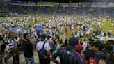 Authorities investigate El Salvador stadium crush with at least 12 people dead