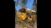 School bus packed with kids hits ditch after nearly head-on wreck, Louisiana cops say