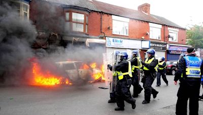 UK riots: Boy who threw paving slab arrives in court with mum and man admits carrying metal pole as a weapon as rioters plead guilty