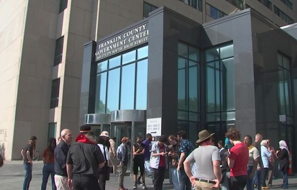 Dozens of protestors gather outside Franklin County Municipal Court after Ohio State students arrested