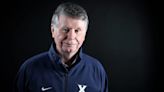 Who is Bill Cunningham, the controversial radio host who interviewed Bob Huggins?