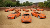 Orchestrated in Orange: A Rare Ensemble of Aston Martins Set for Auction