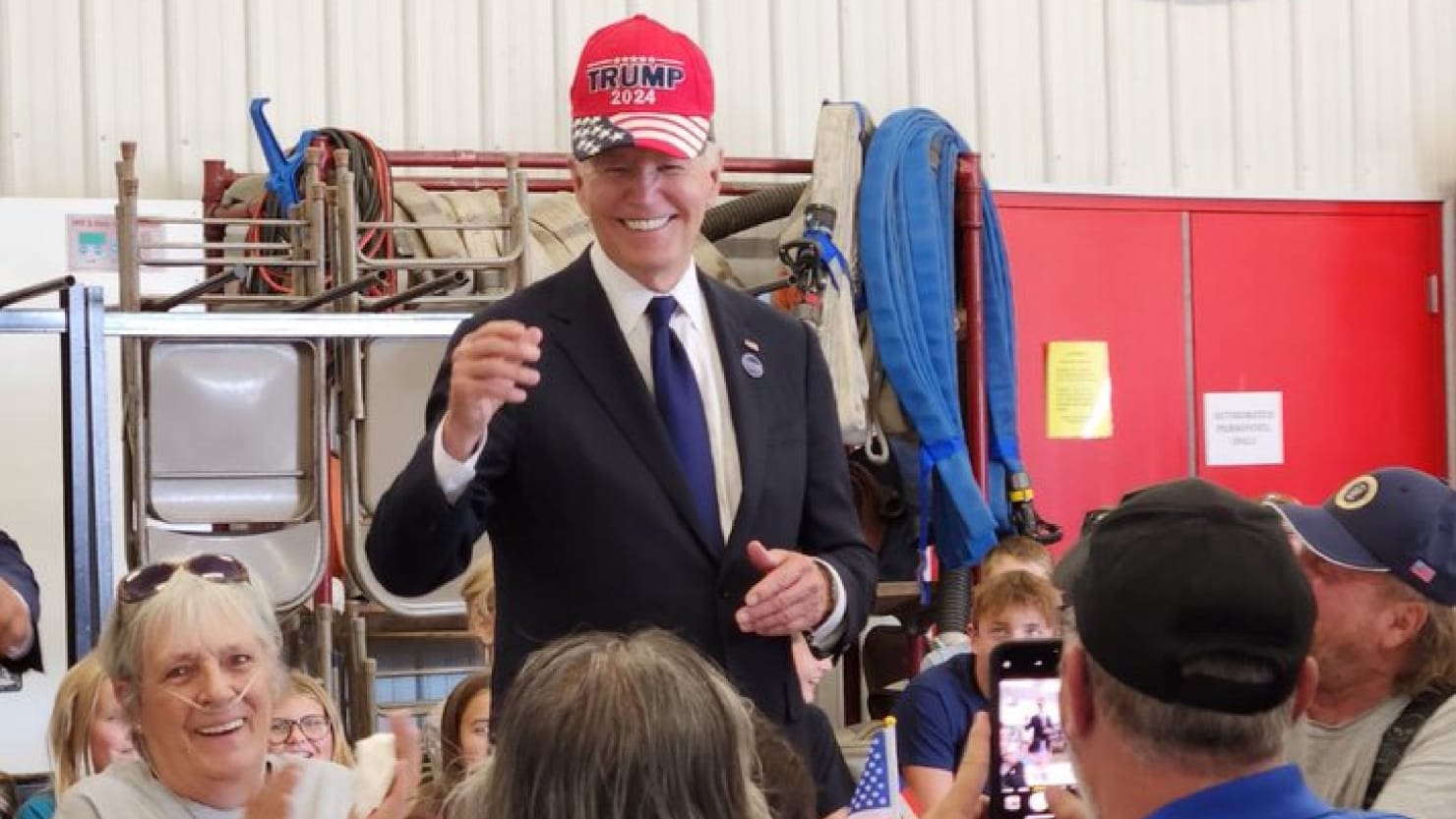 Joe Biden Dons Trump Hat While Discussing Bipartisan Unity on the Campaign Trail