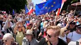 Hundreds of thousands march in Poland anti-government protests to show support for democracy