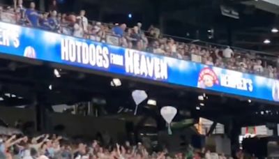 Watch: Seattle Mariners’ fans grab free hot dogs dropped from the sky