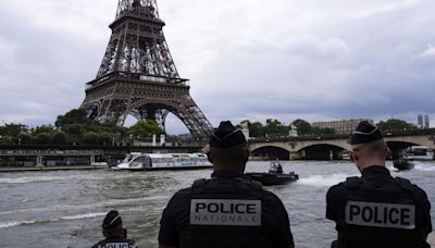 French river police practice on the Seine ahead of Olympics opening ceremony