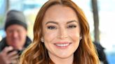 Lindsay Lohan’s naked eye and bold lip combo *screams* holiday in the sun