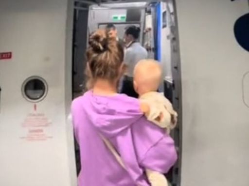 Parents SLAMMED after taking their baby on flight with fever