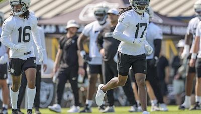 Raiders star wide receiver Davante Adams isn’t going anywhere — for now, at least