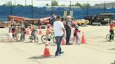 Brighton agencies team up for bike rodeo, teaching kids safety and signaling skills