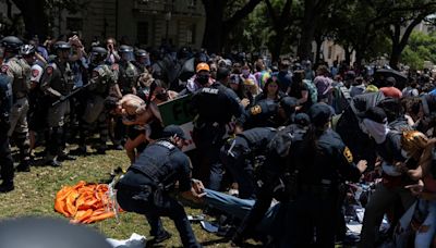 UT-Austin says protesters carried guns and assaulted people. Prosecutors haven't seen proof.