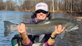 Maine woman battles challenging river conditions to land a trophy trout