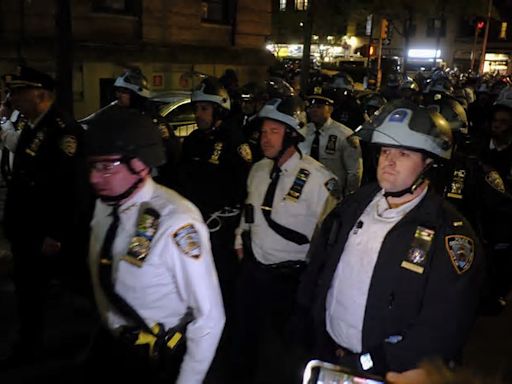 NYPD riot police storm barricaded Columbia building to dislodge protesters