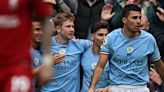 Manchester City hammers Liverpool to keep pressure on Arsenal