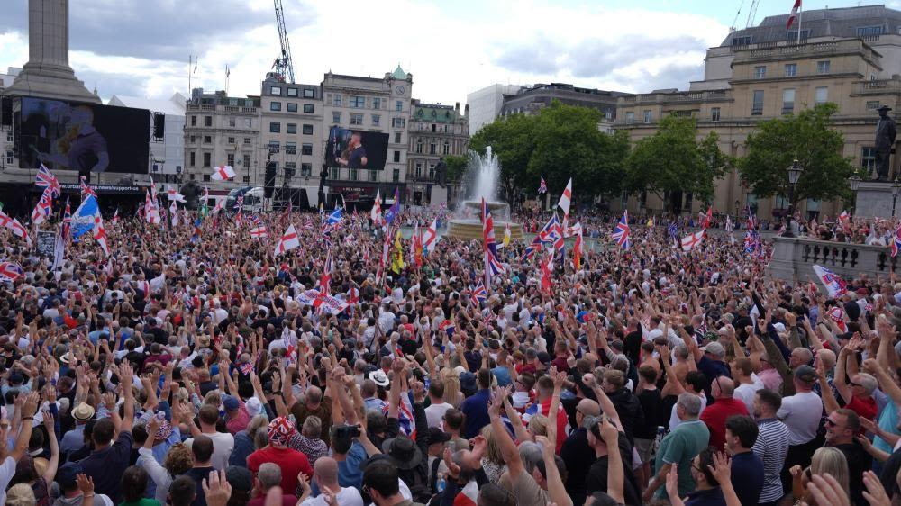 Thousands join Tommy Robinson march in London