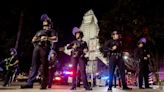 LAPD officers in riot gear face off with protesters after release of Tyre Nichols video