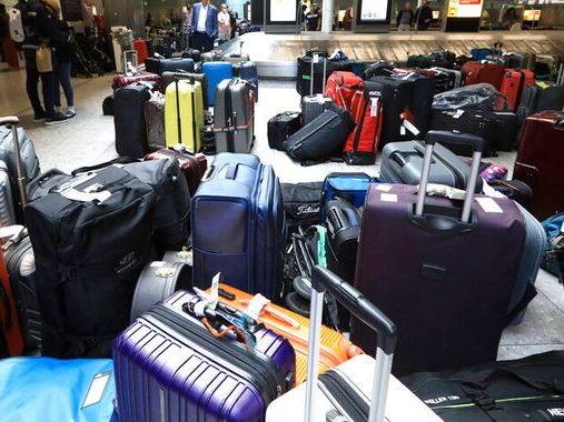 Chaos at Heathrow as baggage delays described as 'disgraceful' and a 'shambles' by British Airways passengers