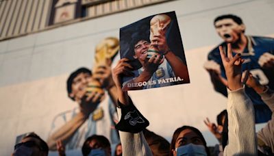 Soccer-Maradona’s children call for moving body to mausoleum for safety and tribute