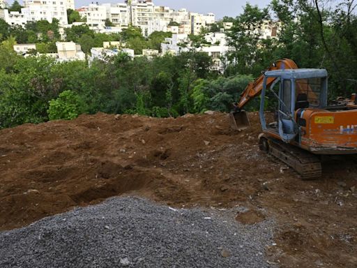 Encroachment of Lotus Pond in broad daylight