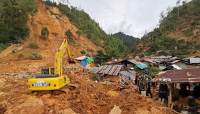 Heavy rains halt search for 30 people missing in an Indonesian landslide that killed at least 23