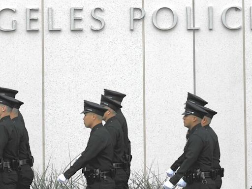 Seven-time felon charged with using machine gun in shooting that injured LAPD officers