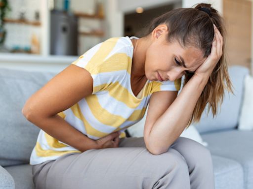 What is ectopic pregnancy and what are the signs and symptoms?