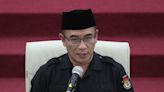 Indonesia dismisses its chief election commissioner over sexual assault