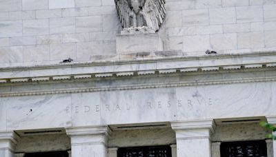 Fed paper sketches out slow slog to unload central bank's mortgage bonds