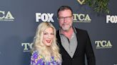 Tori Spelling, 51, shows off sculpted physique in skimpy neon bikini