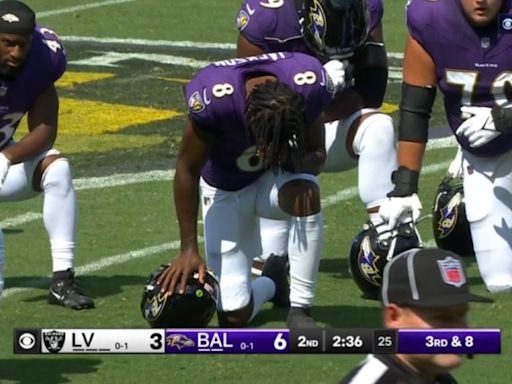 Lamar Jackson and Ravens 'take knee in prayer' as chain gang member receives CPR