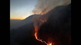 Wildfire engulfs homes in the North Carolina mountains, threatens dozens more