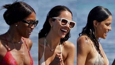 Naomi Campbell, Eiza González e Michelle Rodriguez curtem do sol ao mar em praia de Ibiza; fotos