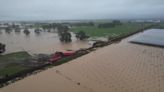 Devasting flash floods and landslides leave at least 4 dead in New Zealand