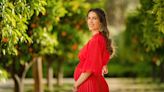 Princess Rajwa Glows in Ruby Red Maxi Dress in First Maternity Portrait