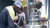 LeBron James can't keep his hands off the Stanley Cup