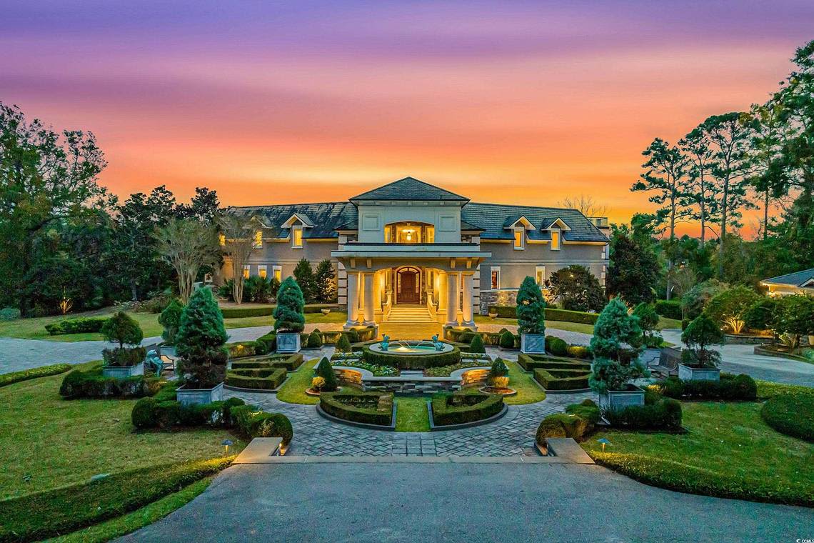 Lakefront mansion with private putting green for sale in Myrtle Beach, SC. Take a look