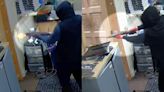 Terrifying moment thugs blast their way into computer shop