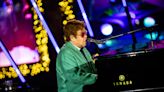 Sir Elton John Performs at Saks Fifth Avenue’s Window Unveiling and Light Show