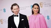 Tom Hiddleston and Zawe Ashton are expecting, she reveals in glossy Vogue photo shoot