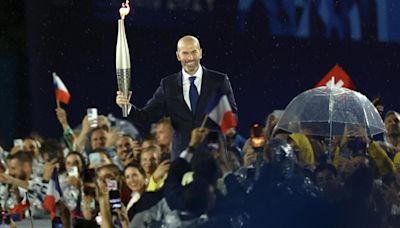 Paris Games open on the Seine under tight security, downpour