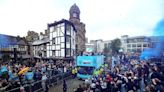 Joyous scenes as thousands of Man City fans flood streets for victory parade