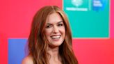 Isla Fisher Sunbathes in Strappy Cutout Swimsuit in New Instagram Photo