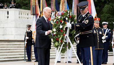 Biden honors fallen troops on Memorial Day, praising commitment "not to a president," but to idea of America